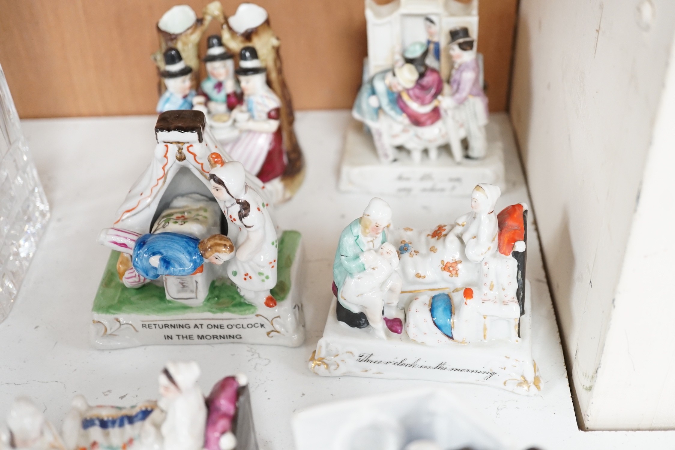 A collection of 14 German porcelain Fairings and a related book - Antiques collectors guide by Derek H. Jordan